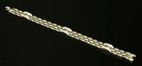 Lot 436 - An 18ct white gold diamond set panther style bracelet