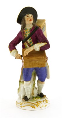 Lot 240 - A Meissen porcelain figure of an hurdy-gurdy player