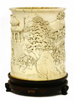 Lot 240 - A Chinese ivory brush pot