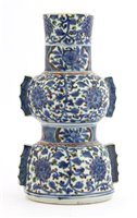 Lot 33 - A Chinese wucai gu vase