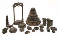Lot 442 - A collection of Chinese wood stands