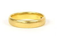 Lot 44 - A 22ct gold court shaped wedding rings