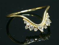 Lot 362 - An 18ct gold sapphire and diamond wishbone ring, attributed to Fernando Jorge