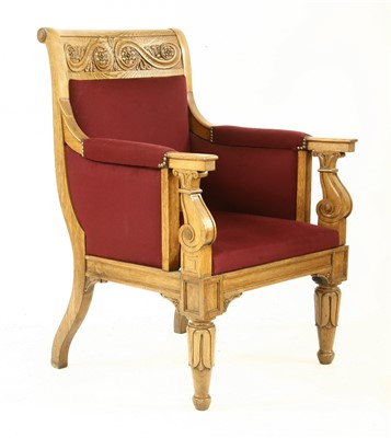 Lot 34 - A large oak library chair
