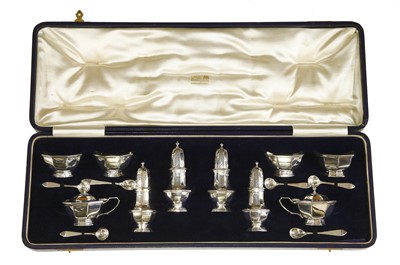 Lot 124 - A fourteen-piece silver cruet set