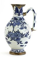 Lot 458 - A Chinese blue and white ewer