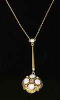 Lot 111 - A late Victorian gold, diamond and opal Etruscan revival Edna May pendant