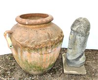 Lot 274 - A large terracotta oil jar