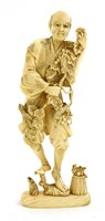 Lot 357 - A Japanese ivory okimono