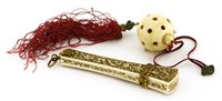 Lot 212 - A Chinese ivory compass and a ball