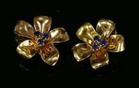 Lot 216 - A pair of gold, sapphire flower head earrings, c.1950