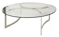 Lot 499 - A circular glass coffee table