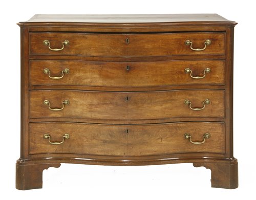 Lot 655 - A George III mahogany serpentine commode chest