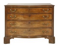 Lot 655 - A George III mahogany serpentine commode chest
