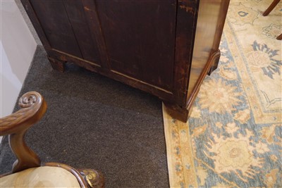 Lot 655 - A George III mahogany serpentine commode chest