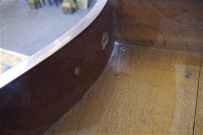 Lot 655 - A George III mahogany serpentine commode chest