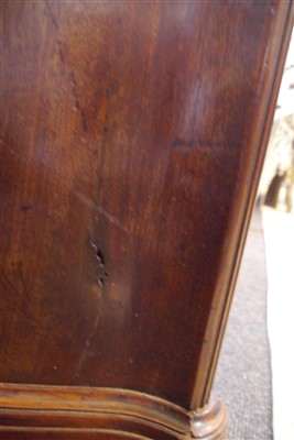 Lot 655 - A George III mahogany serpentine commode chest