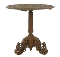 Lot 793 - An Indian hardwood centre table