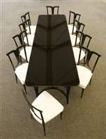 Lot 457 - An Italian ebonised dining table