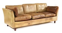 Lot 392 - A Danish tan leather three seat settee