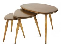 Lot 470 - A nest of three Ercol 'Pebble' tables