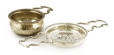 Lot 109 - Two Georgian silver lemon-squeezers