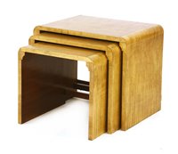 Lot 203 - An Art Deco maple nest of tables