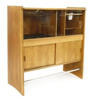 Lot 482 - A Danish teak bar