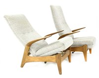 Lot 488 - A pair of teak armchairs