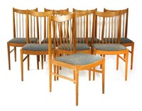 Lot 495 - A set of eight teak dining chairs