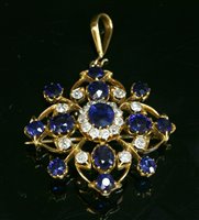 Lot 77 - A Victorian sapphire and diamond gold brooch/pendant, c.1890