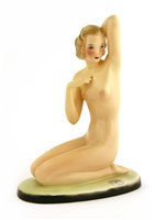 Lot 81 - A Goldscheider figure of a kneeling nude