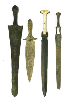 Lot 233 - Antiquities: four bronze daggers
