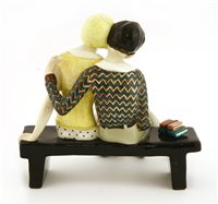 Lot 95 - A Lenci figure of a couple rested on a bench