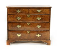 Lot 542 - A Queen Anne figured walnut chest