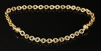 Lot 375 - A gold hollow trace link necklace and bracelet suite