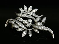Lot 306 - A diamond set spray brooch