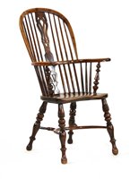 Lot 510 - A yew wood and elm high back Windsor chair