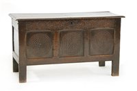 Lot 543 - An oak coffer