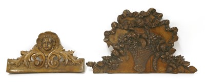 Lot 518 - A French walnut floral and fruit carving