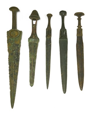 Lot 506 - Five bronze daggers