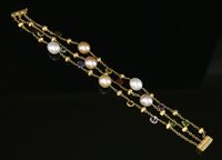 Lot 421 - An 18ct gold three row 'Paradise' gemstone and cultured freshwater pearl bracelet