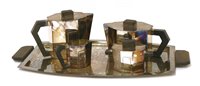 Lot 116 - An Art Deco style silver plated four piece tea set