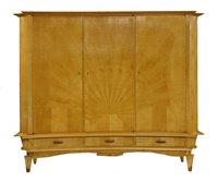 Lot 575 - An Italian maple cupboard