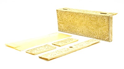 Lot 52 - A Chinese ivory arm rest