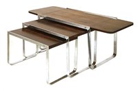 Lot 543 - A nest of three rosewood and chrome tables