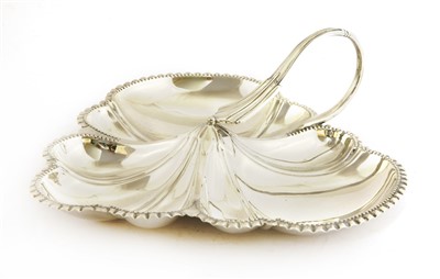 Lot 17 - A silver trefoil dish and handle