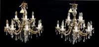 Lot 162A - A set of six cut glass twelve light hanging electroliers