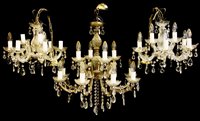 Lot 174 - A set of seven cut glass twelve light hanging electroliers