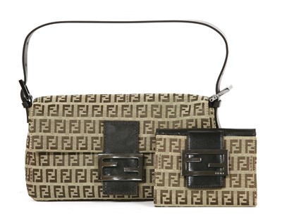 Lot 765 - A Fendi beige and brown monogram canvas baguette handbag